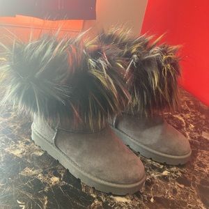 Grey boots with multi color fur top.